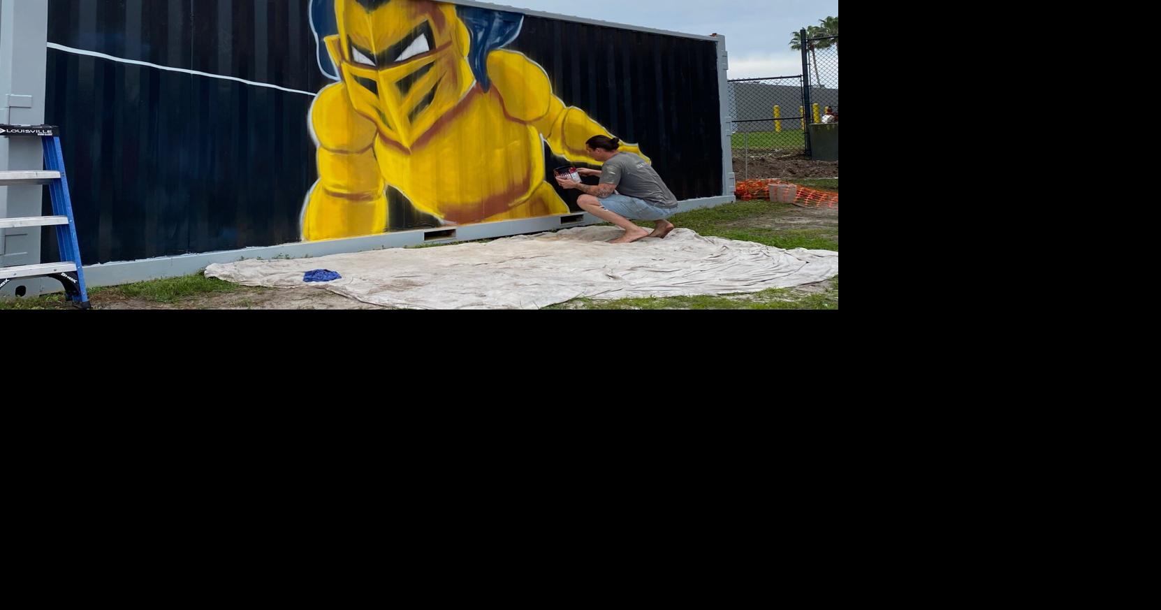 Pigments of passion: Former UCF football player paints Knightro mural ...
