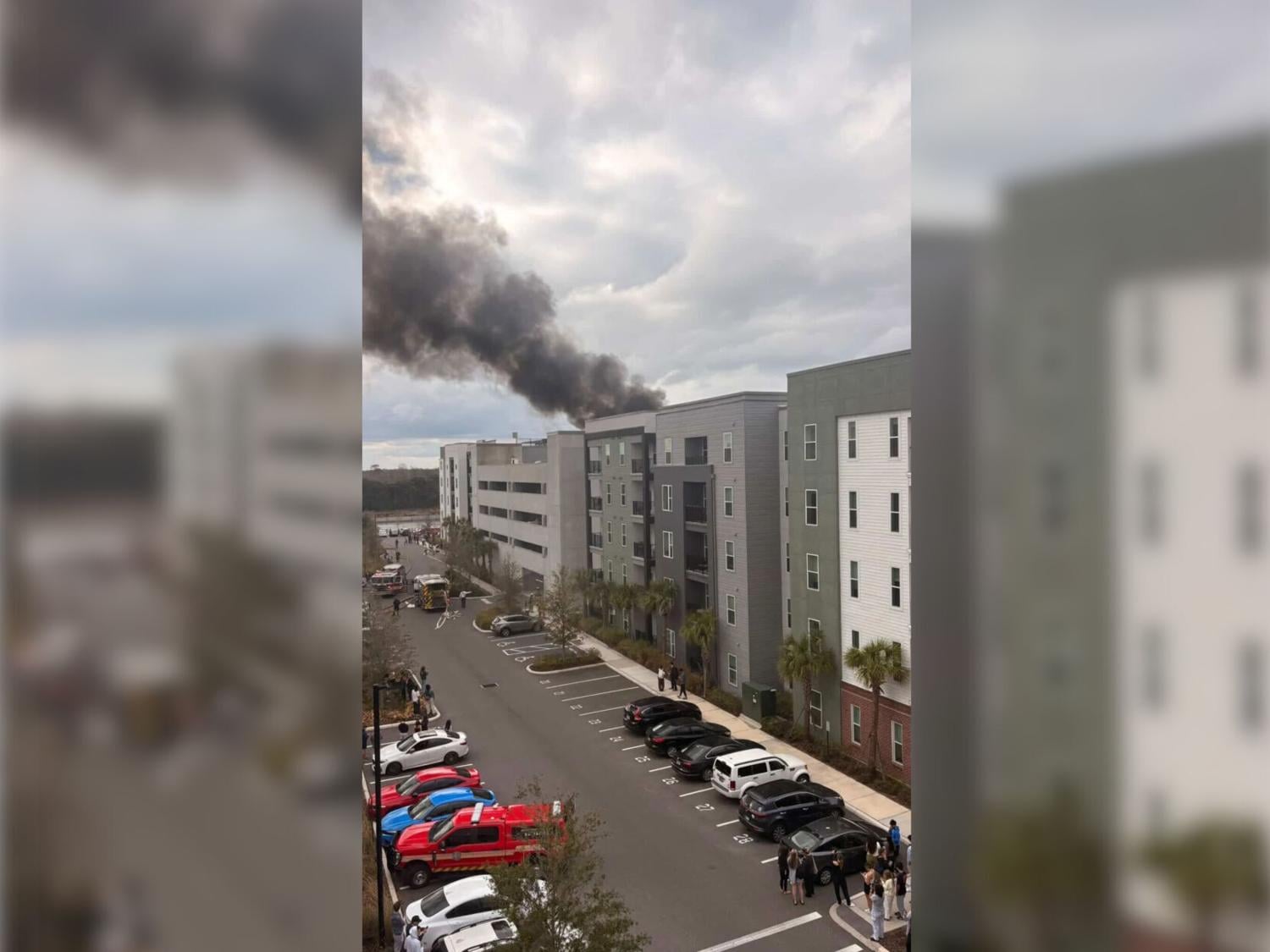 Vehicles catch fire on parking garage at off-campus housing complex ...