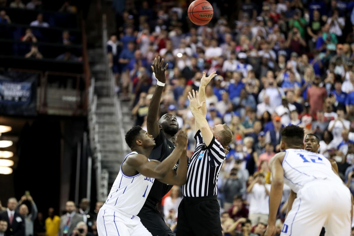 Tacko and Zion fight for ball at tipoff
