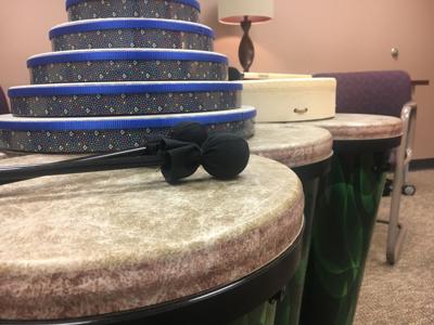 UCF students relieve stress by beating drums