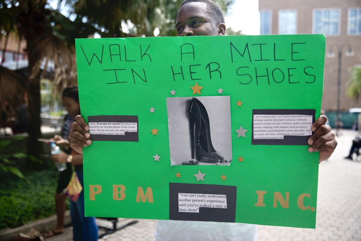 ‘A Mile In Her Shoes’: UCF organization hosts walk for domestic violence awareness month