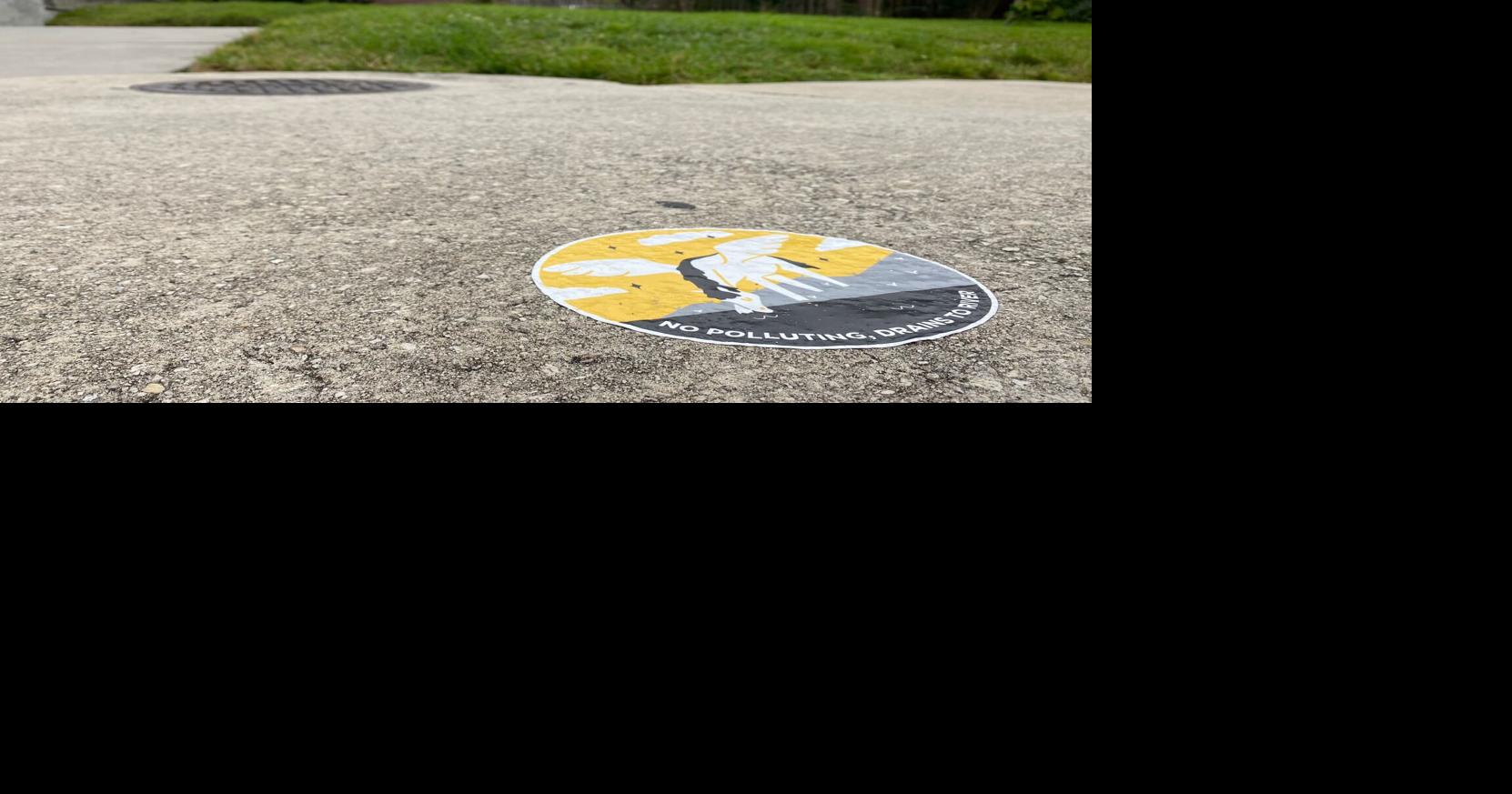 UCF Arboretum curb inlet stickers promote stormwater infrastructure ...