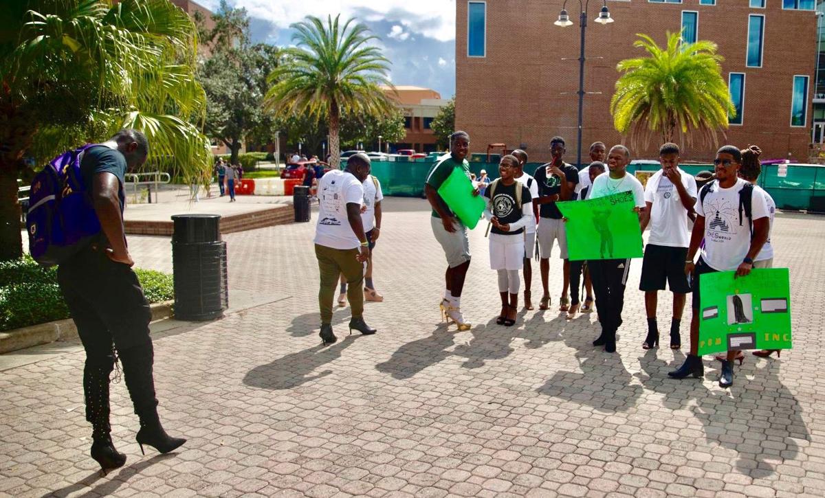 ‘A Mile In Her Shoes’: UCF organization hosts walk for domestic violence awareness month