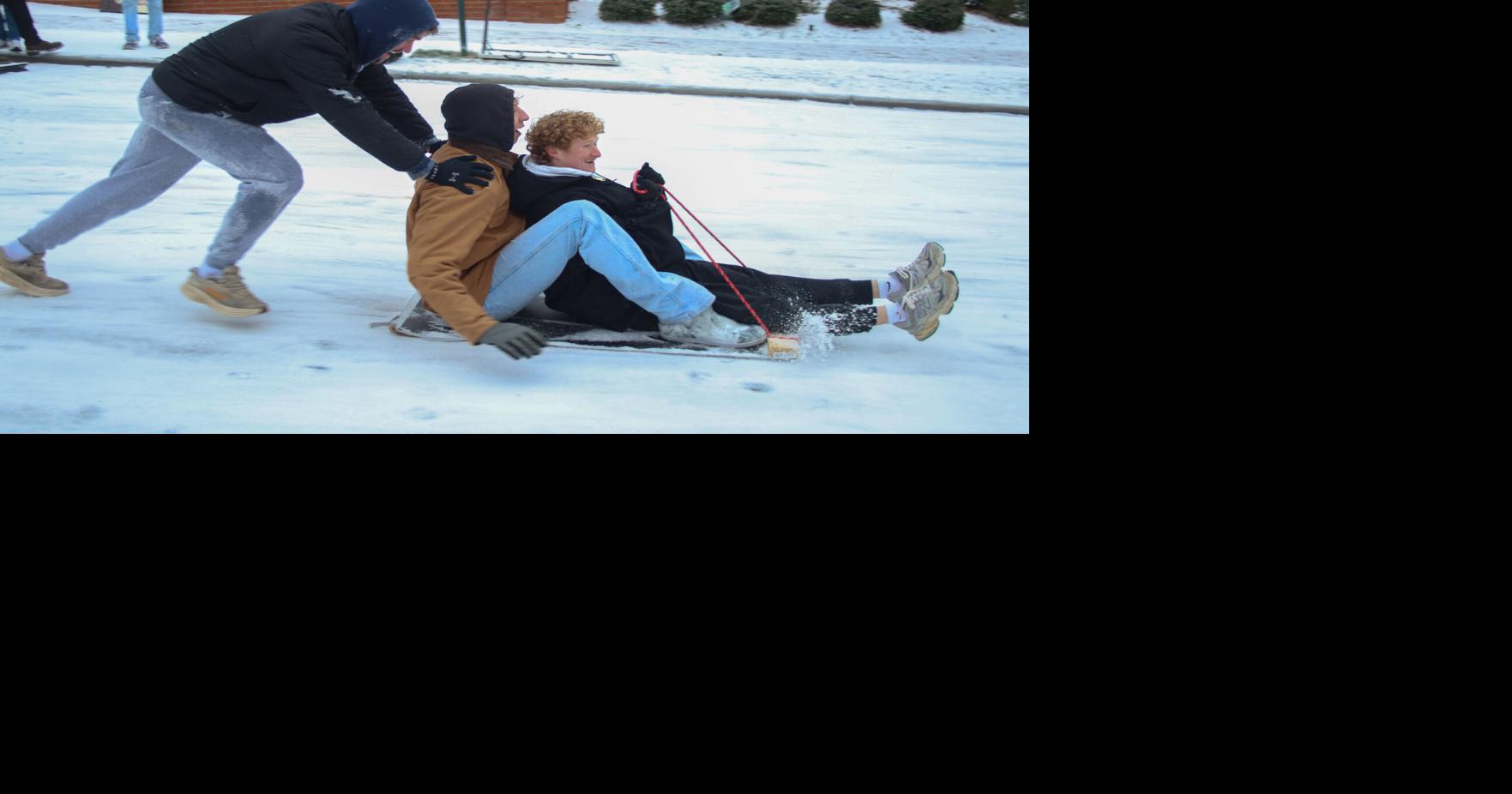 Trash can lids and toboggans take over as Craver Road turns Into a snow day free-for-all yet again