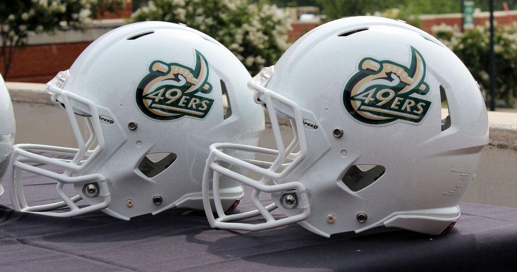 charlotte flair football helmet Charlotte unveils first official helmet for football program | Sports