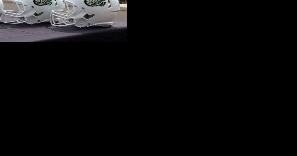 charlotte football helmet away Charlotte unveils first official helmet for football program | Sports