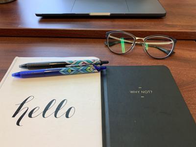 Journal and glasses