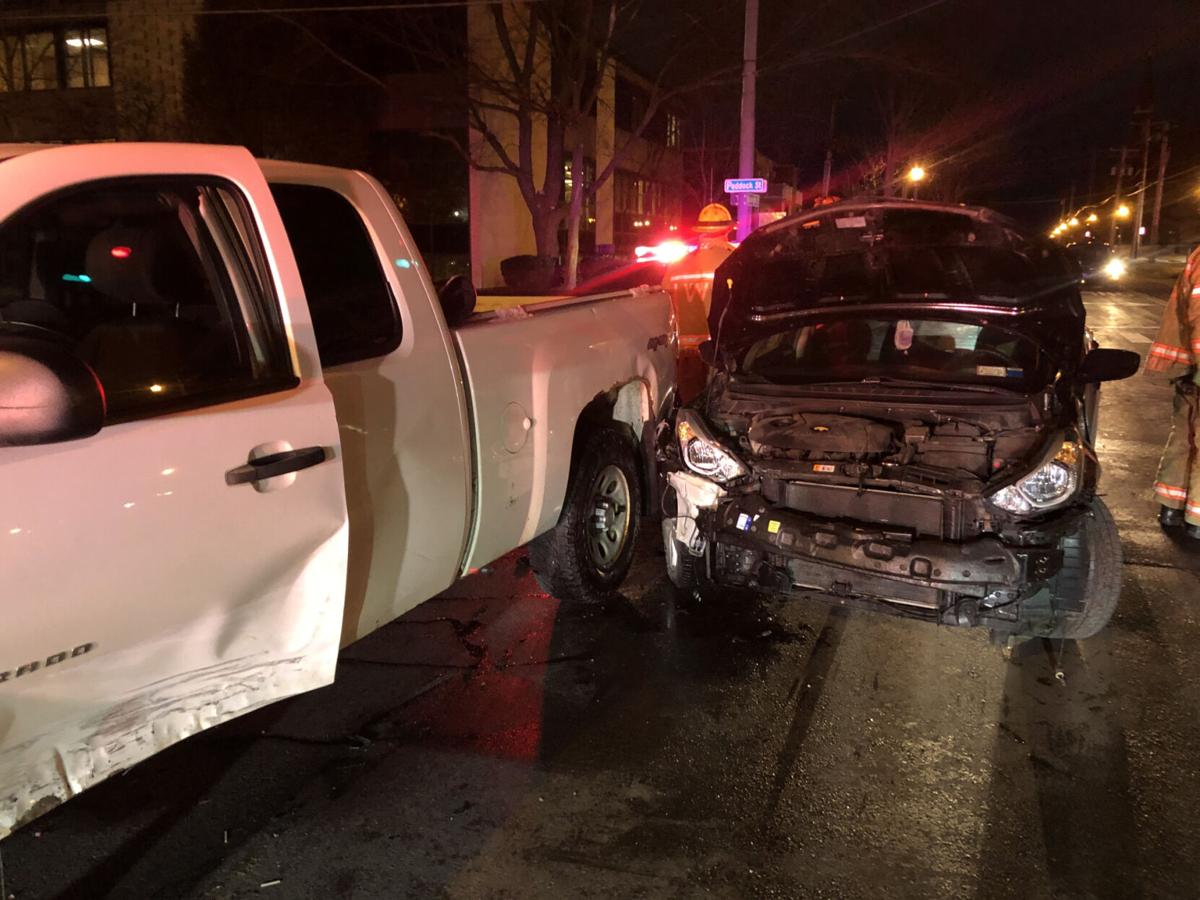 Two adults, one child uninjured in crash on Washington Street