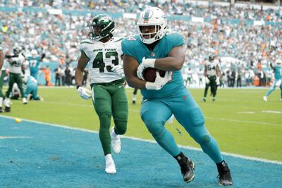 SPORTS-FBN-JETS-DOLPHINS-GET