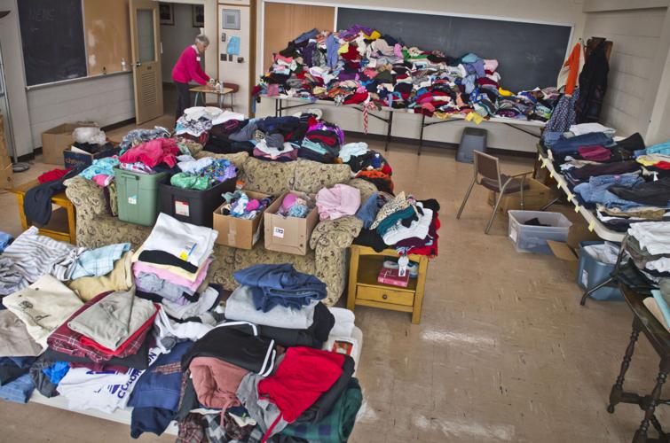 PHOTOS Sorting donations for fire victims Community Giving