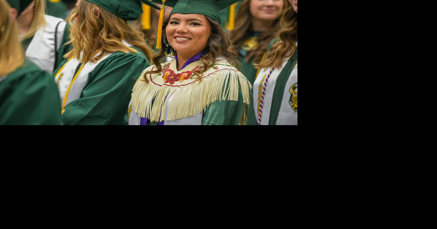 Clarkson graduate is first to wear traditional regalia to commencement