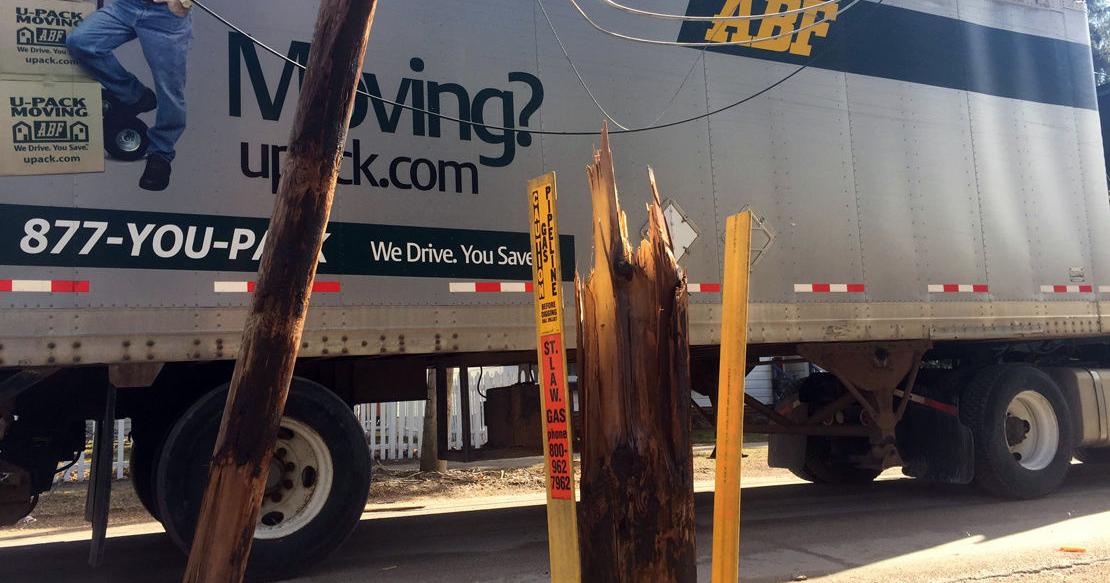 Truck pulls down power lines, utility poles, causing power outages in ...