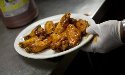 Wings and guacamole are cheaper in time for Super Bowl