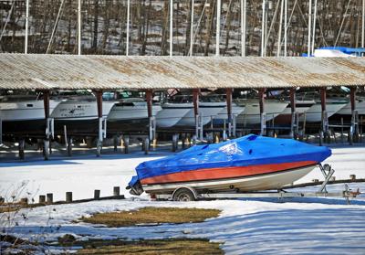 Fishing Charters Left Out In The Cold Lingering Ice Frozen