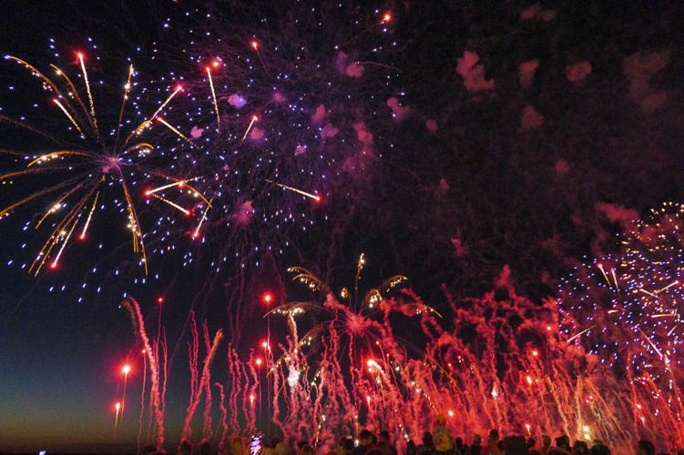 Harborfest fireworks fill the sky over Oswego Harbor Arts and