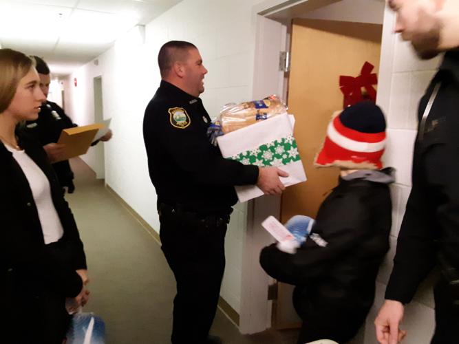 Massena Police Departments delivers holiday boxes for Massena