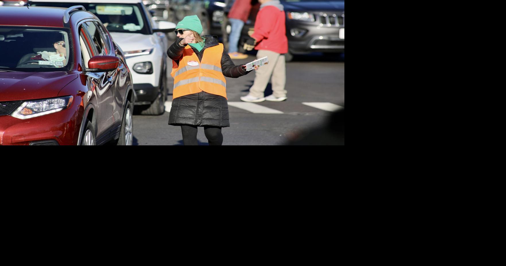 Turkeys flying Saturday morning during 1,000 bird giveaway in Watertown