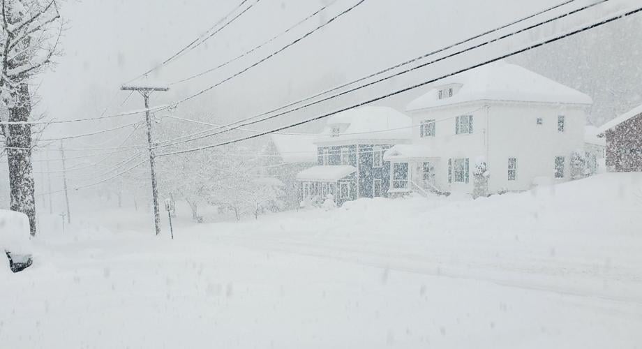 Snow total tops 6 feet in parts of the north country; residents dig out ...