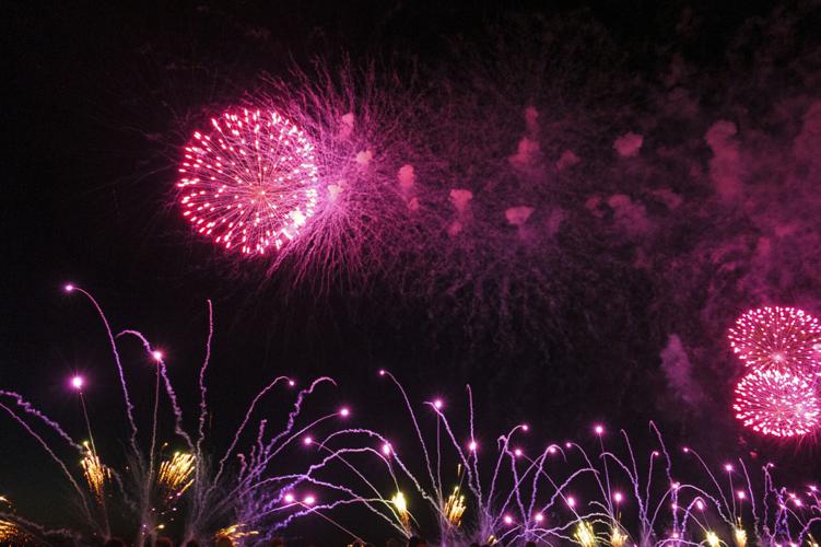 Harborfest fireworks fill the sky over Oswego Harbor Arts and