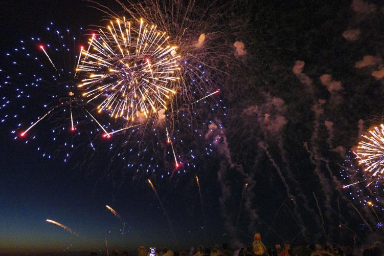 Harborfest fireworks fill the sky over Oswego Harbor Arts and