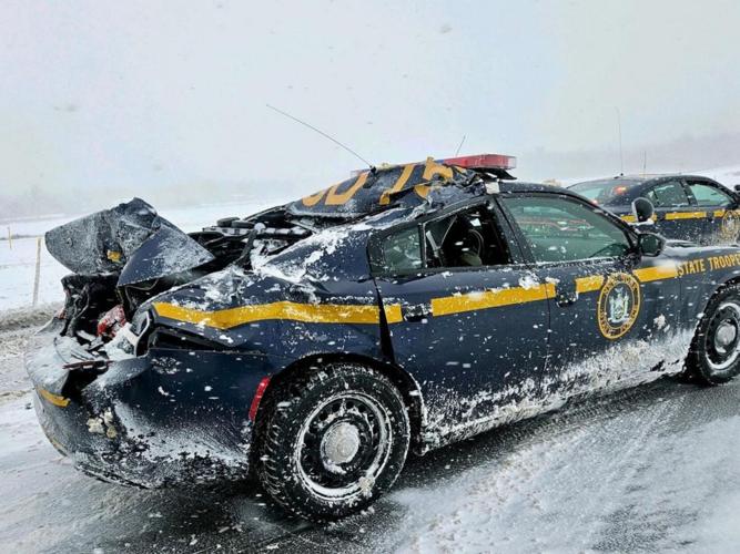 Tractortrailer hits state police vehicle Police Blotters