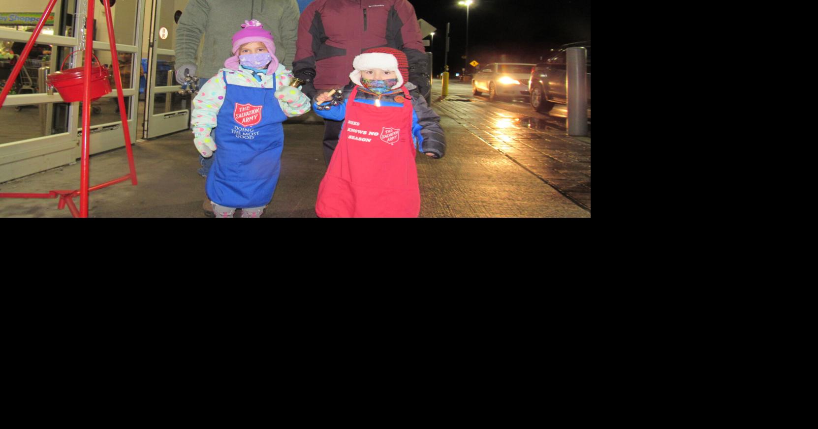 Trinity Catholic School students take turns manning Salvation Army red