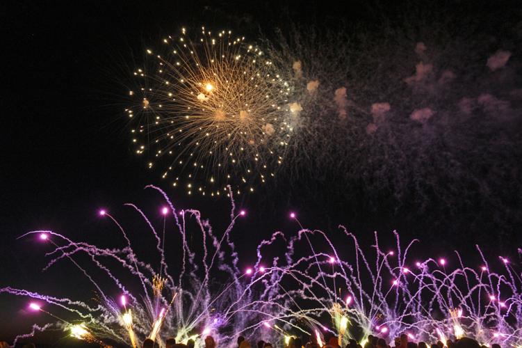 Harborfest fireworks fill the sky over Oswego Harbor Arts and