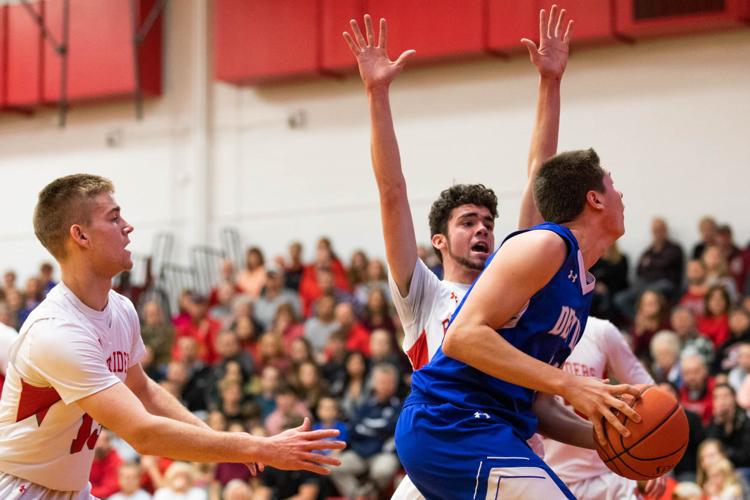 High school boys basketball Lowville answers challenge with key