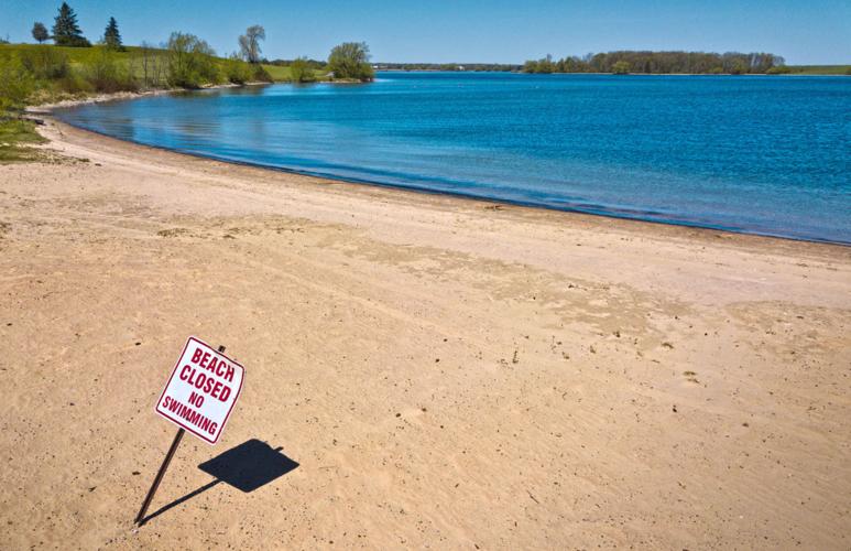 State beaches open to public this weekend, local beaches holding out