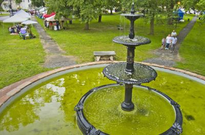 Green water flows from Canton fountain