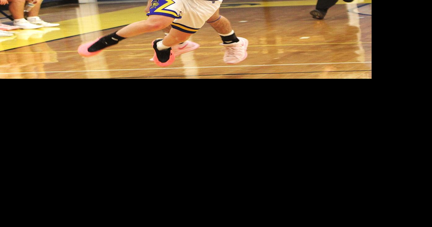 Lisbon boys down M-W; Bulldogs hit 14 threes