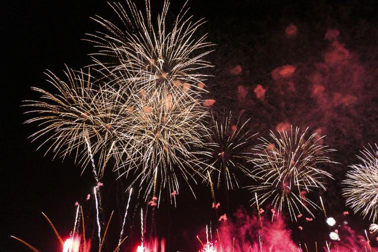 Harborfest fireworks fill the sky over Oswego Harbor Arts and
