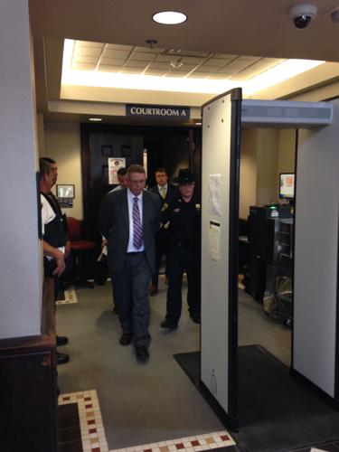 Troopers: Ex convict former town justice threatened to burn down