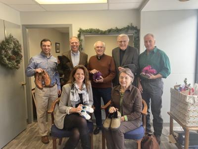 ‘Tithe My Shoes’ collectors meet to deliver and bless shoes