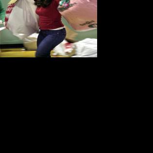 Volunteers help bring holiday cheer to families | News | nny360.com