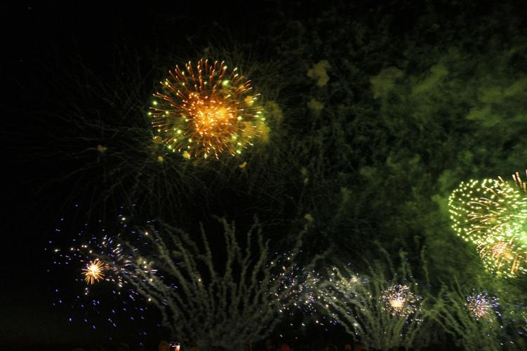 Harborfest fireworks fill the sky over Oswego Harbor Arts and