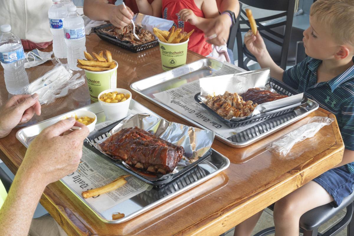 Barbecue, bourbon joint holds soft opening in Watertown’s Public Square Business