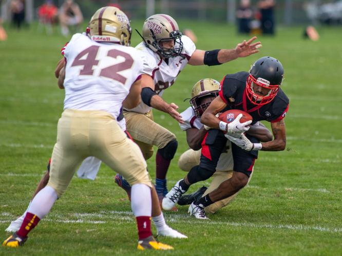 Semipro football Red and Black debuts with quarterback tandem, victory