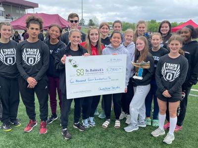 Oswego, Fulton track teams combine forces for St. Baldrick’s Foundation