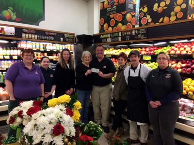 IGA raises $3,010 for Potsdam Holiday Fund through sale of ‘happiness’ tags