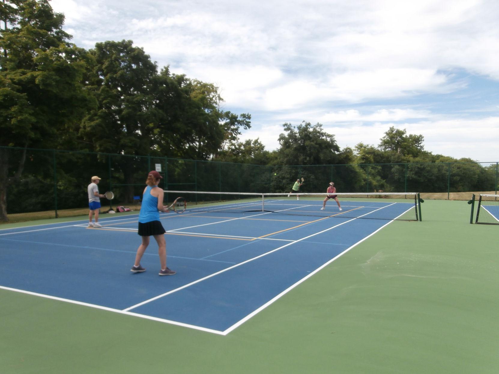 City crews spruce up tennis courts | News | nny360.com