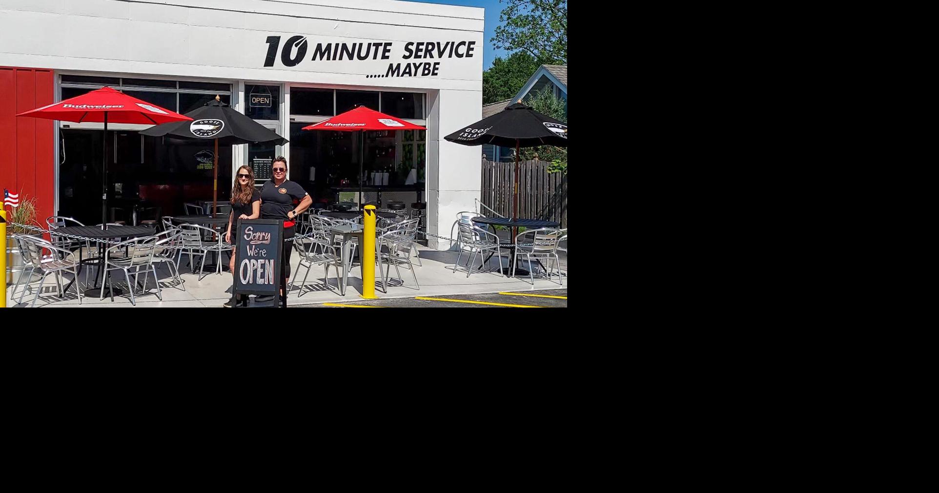 New bar and grill at a former oil-change business serves up ...