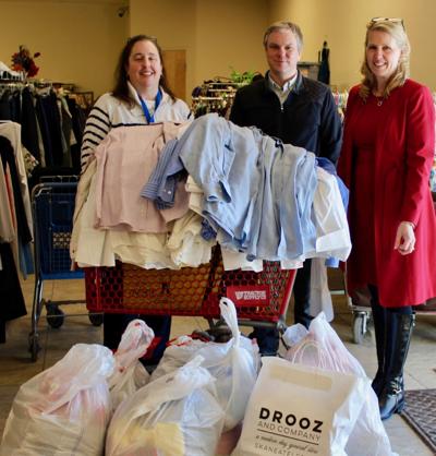 CNY Pomeroy Appraisers donates professional dress clothing to Catholic Charities