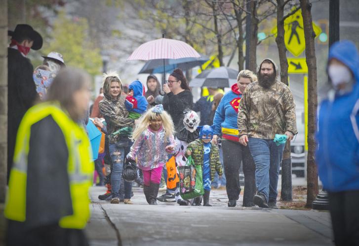 Rain doesn’t spook Canton trickortreaters Arts and Entertainment