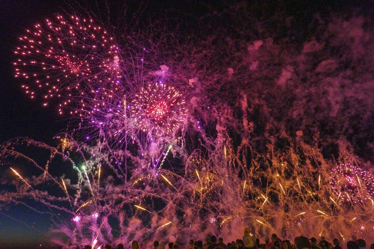 Harborfest fireworks fill the sky over Oswego Harbor Arts and