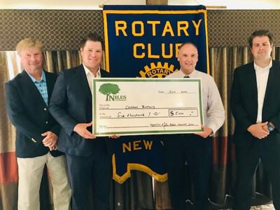 Niles Asset Management donates $5,000 to Canton rotary