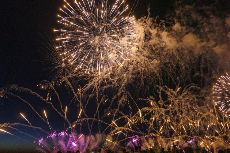 Harborfest fireworks fill the sky over Oswego Harbor Arts and