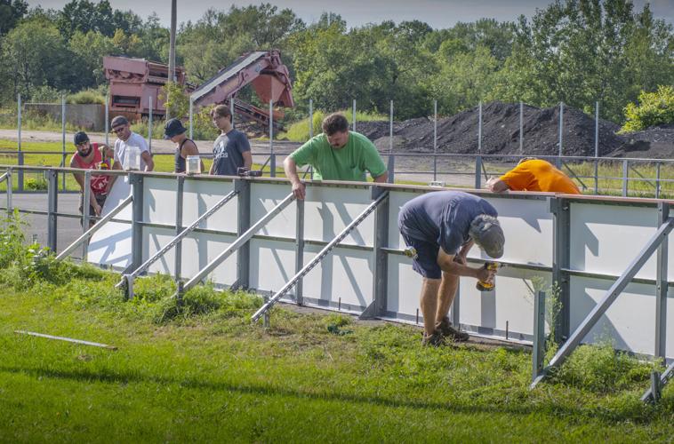 Volunteers get to work on Canton’s outdoor rink Community Notes