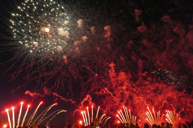 Harborfest fireworks fill the sky over Oswego Harbor Arts and
