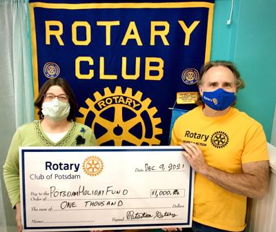 Rotary club donates to Potsdam holiday fund